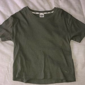 green t-shirt along with a pair of tie-dye sweats